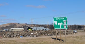 Piles of debris, ice and water swamped the intersection of Highways 12 and 14 near the Niobrara River and Morman Canal bridge