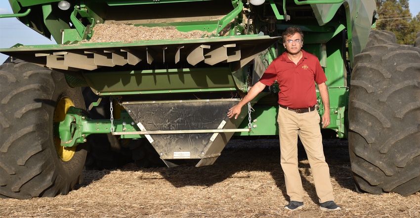 Prashant Jha shows off the chaff-gathering tool attached to a combine. The Prashant Jha shows off the chaff-gathering tool attached to a combine. The