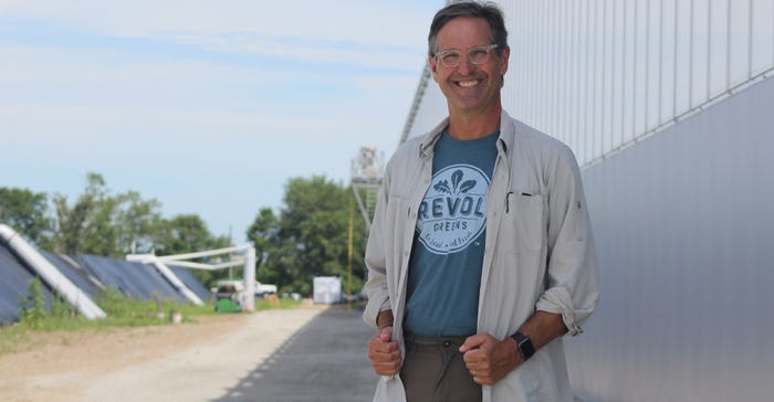 Revol Greens CEO Mark Schulze stands outside the Revol greenhouse in Medford, Minn. 