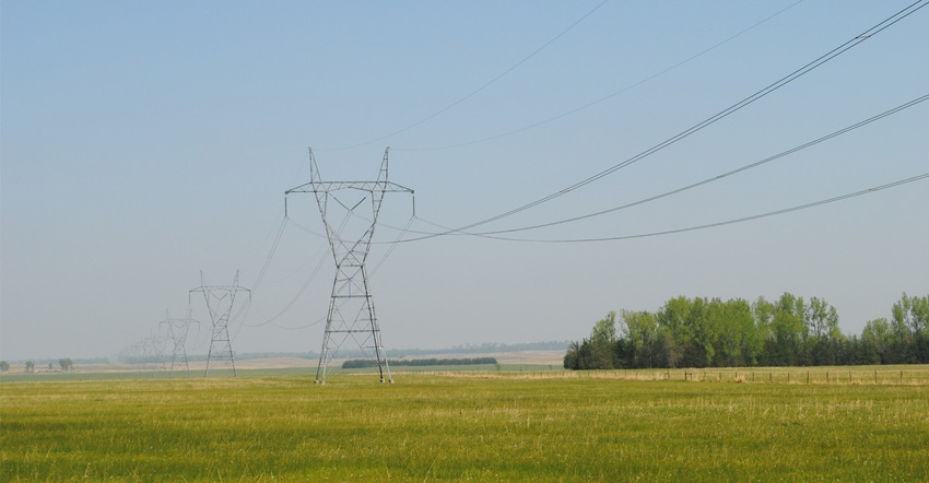 Power lines and farm field
