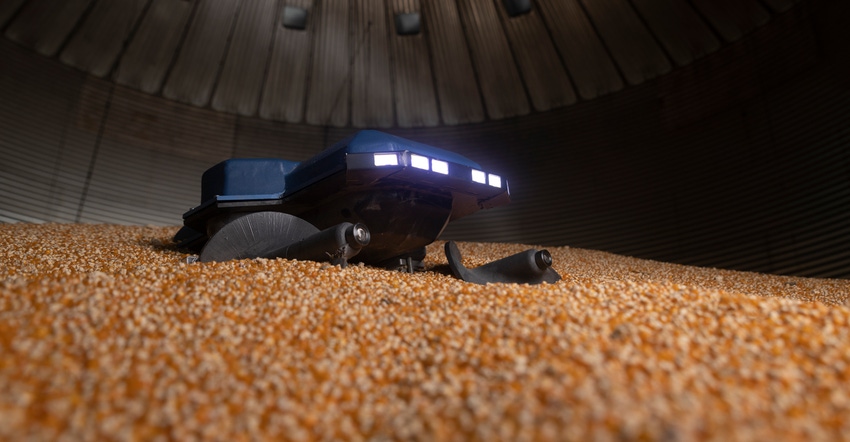 Grain Weevil (a small auger-driven robot ) in field to help level grain in grain bin