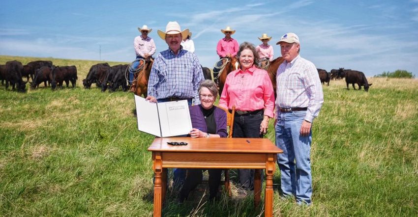 Kansas Governor Laura Kelly officially signs the proclamation declaring May as “Kansas Beef Month.” Frank and Jan Lyons  