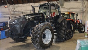 A Case Magnum 400 tractor in all black with tracks