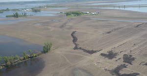 This aerial photo, taken along the Missouri River in mid-May, shows the ongoing impact of high water and flooding. These blac
