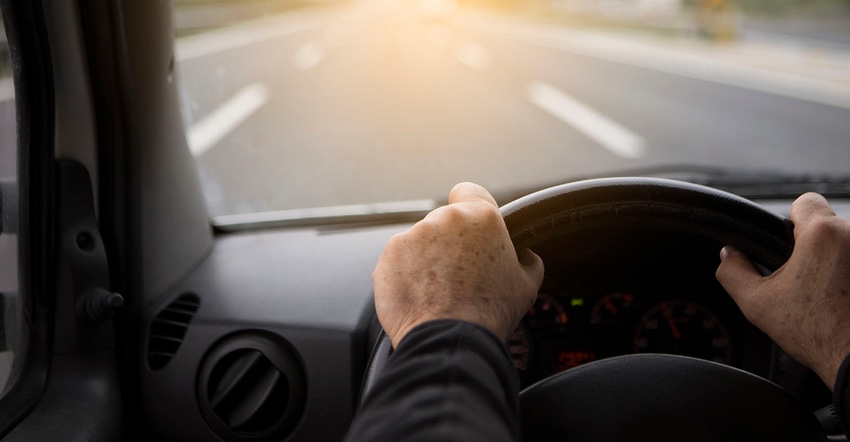 Driving van on highway.