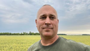 Brad Kamprath in his soft red winter wheat field in southeast Michigan