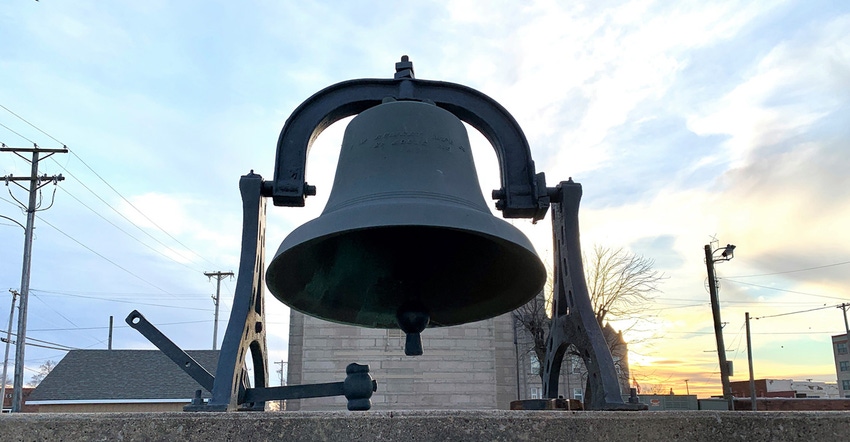 A close up image of a large bell