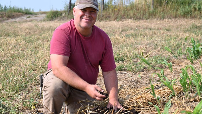 Doug Steffen holding dirt