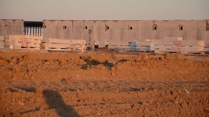 the beginnings of a cement warehouse being built 
