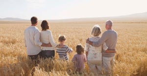 Family in wheat field
