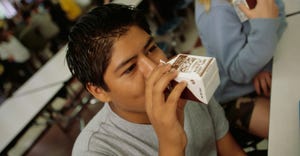 boy drinking chocolate milk