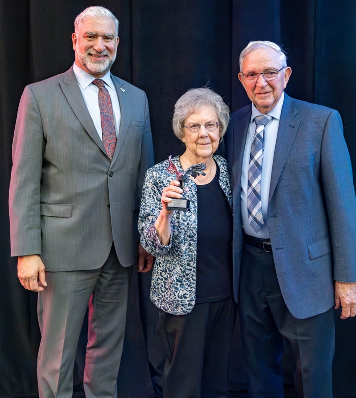 Courtesy of NEFB - Ellen Hellerich, Silver Eagle award winner for 2023, poses with her husband, Gary, and NEFB President Mark McHargue 