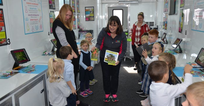 teacher Kerri Underwood and Domenic Franconi’s wife Kristine Franconi accompany the Pre-K class at Assumption of the Blesse