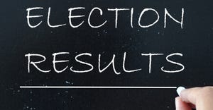 election results written on board with chalk