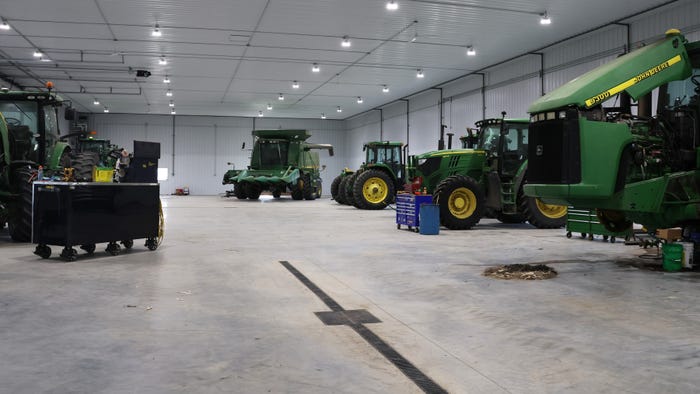  a new farm shop, built by Summit Construction, with farm machinery