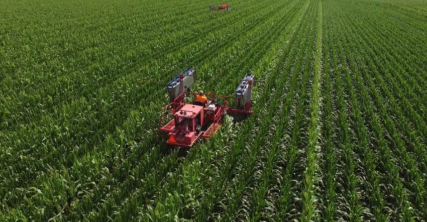 Machines collecting corn pollen that will be preserved