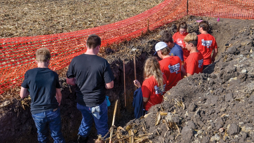  Indiana and Illinois FFA soil judgers hone their skills on a practice pit
