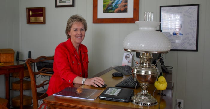 Jenny Rhodes, owner of Deerfield Farm in Centreville, Md. in her home office