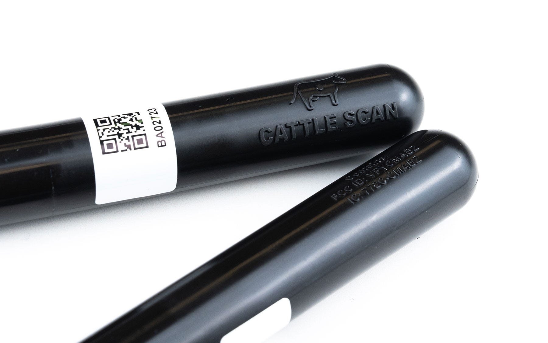 Courtesy of Cattle Scan - A product shot of two cylindrical devices with rounded ends set against a white background