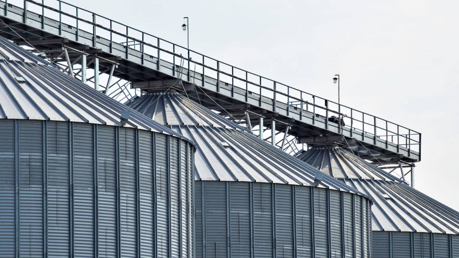 Sales Strategies For Old Crop Corn   GettyImages Three Large Grain Bins Getty IStockPhoto 1800x1012 