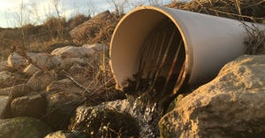 drainage pipe with water flowing out