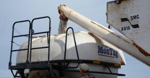 fertilizer being loaded into tank