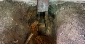 hole dug around building post