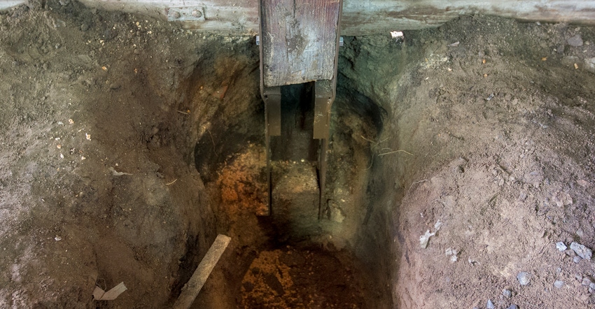 hole dug around building post