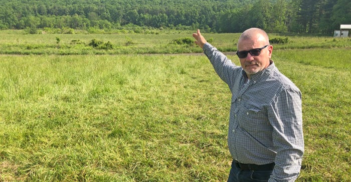 Brian Miller points to future site of the Sustainable Resource Facility