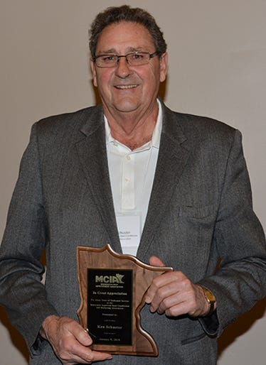 Ken Schuster, service award to the Minnesota Approved Seed Condition & Marketing Association