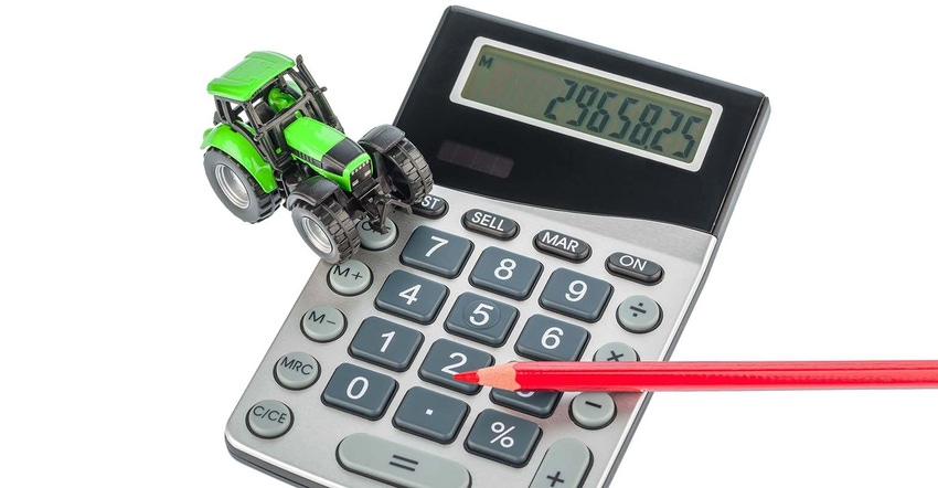calculator, tractor and red pencil