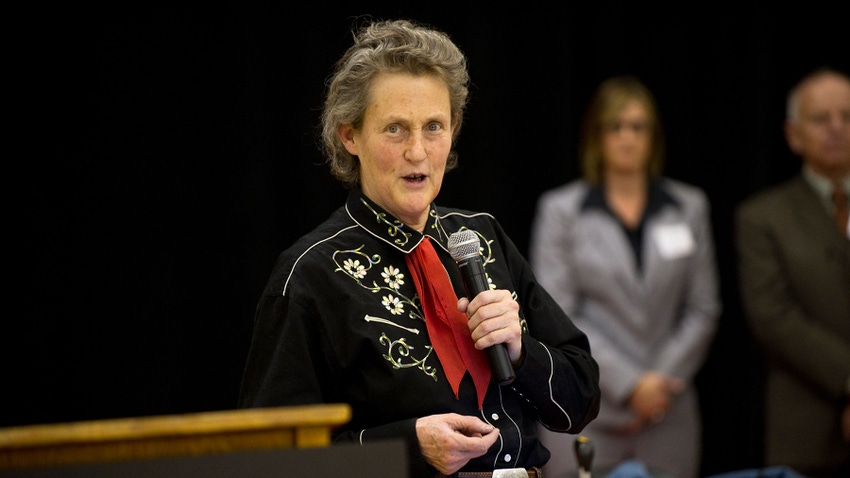 Temple Grandin speaking into microphone