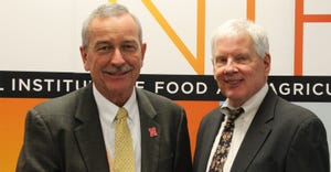 Chuck Hibberd (left), dean and director of Nebraska Extension, poses with J. Scott Angle, director of the National Institute 