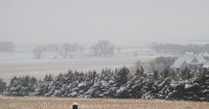 Farmland covered with a dusting of snow