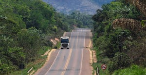 Truck traveling on road in Brazil.