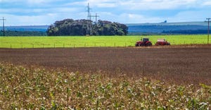 tractor with planter in soy and corn field in Brazil