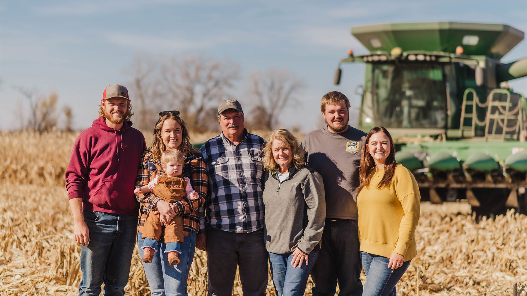 Farmers harvest corn at the Field of Dreams