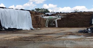 An Aurox drone hovers in a bunk silo