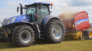 New Holland tractor and baler making bales of hay