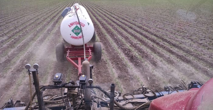 view of anhydrous tank from cab of tractor