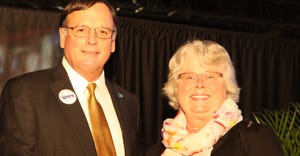 Iowa State University professor Sue Lamont is presented the Lamplighter Award by John Prestage of the U.S. Poultry & Egg Asso