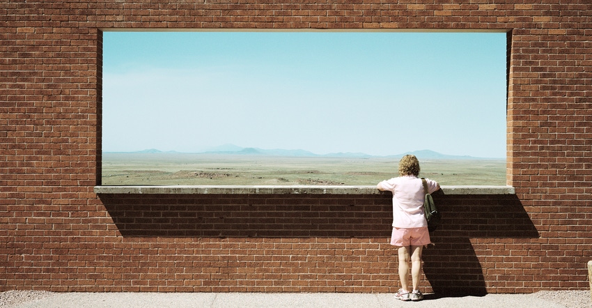 Woman at meteor crater viewpoint