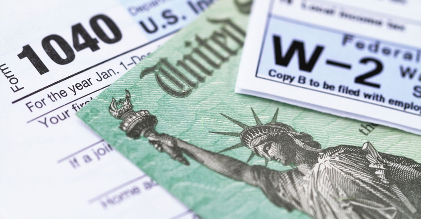 Close up of W-2 and 1040 tax forms