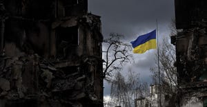 The Ukrainian flag flutters between buildings destroyed in the Ukrainian town of Borodianka in the Kyiv region on April 17.
