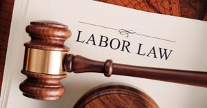 Gavel on labor law document