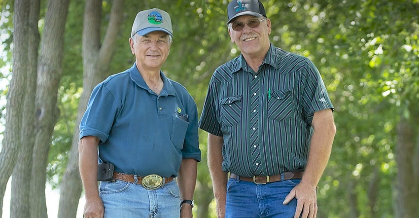 Jack Majeres (right) works with Larry Hauglid (left) to promote soil health on rented farm acres. 