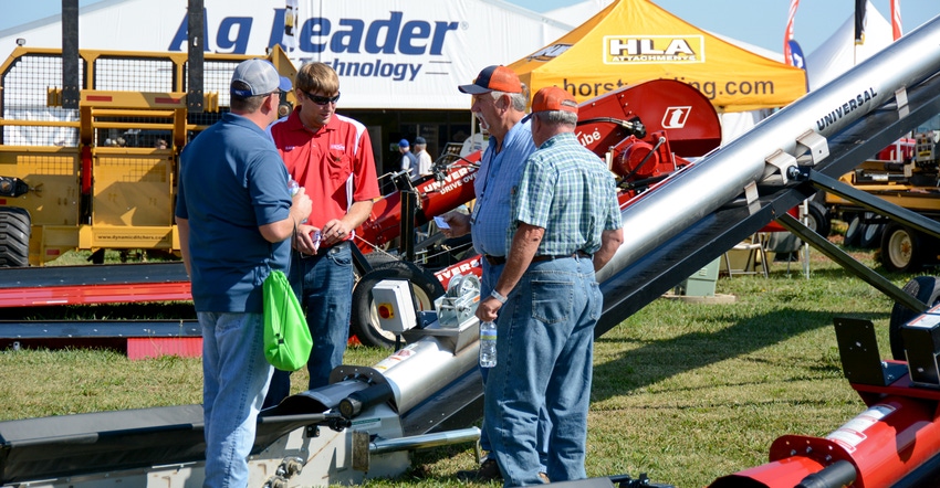 equipment dealers talking with show attendees