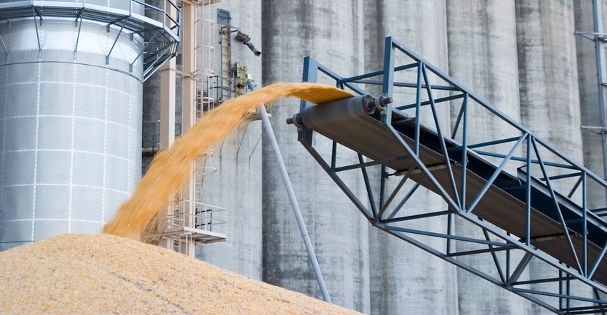 grain pouring onto pile