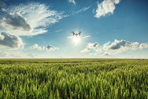 flying-drone-over-green-wheat-GettyImages-537635746 (003).jpg