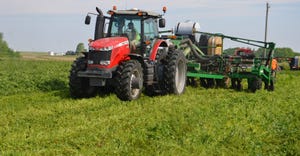 tractor planting into cover crops